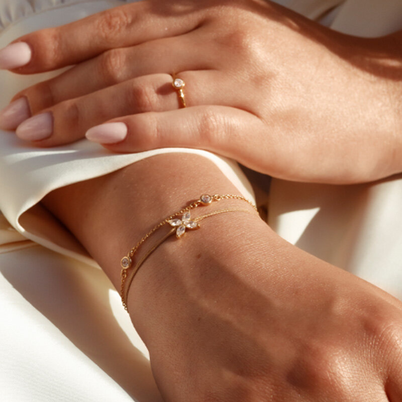 Ohrstecker Triple Zirkonia, 18 K Rosegold vergoldet