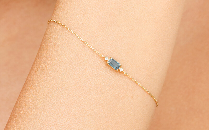 Armkette Blue Topaz, 14 K Weissgold