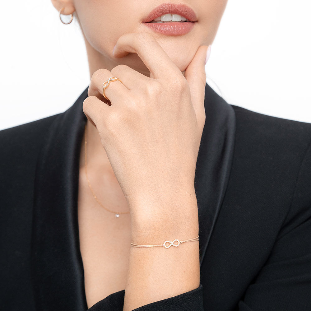 Freundschaftsarmband Infinity mit Diamanten, 18 Karat Rosegold Bild 3