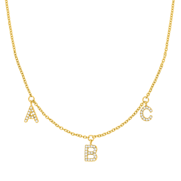 Buchstabenkette mit drei Buchstaben aus Gold mit Diamanten