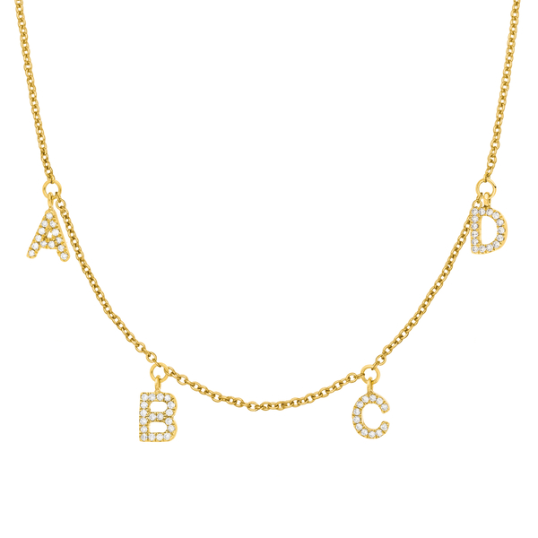Buchstabenkette mit vier Buchstaben aus Gold mit Diamanten