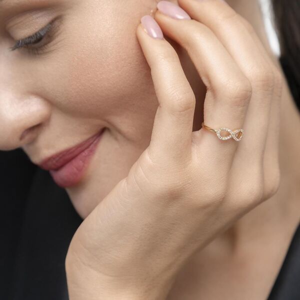 Infinityring mit Diamanten, 18 Karat Gelbgold Bild 3
